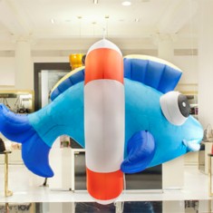 Blue and orange hanging inflatable fish